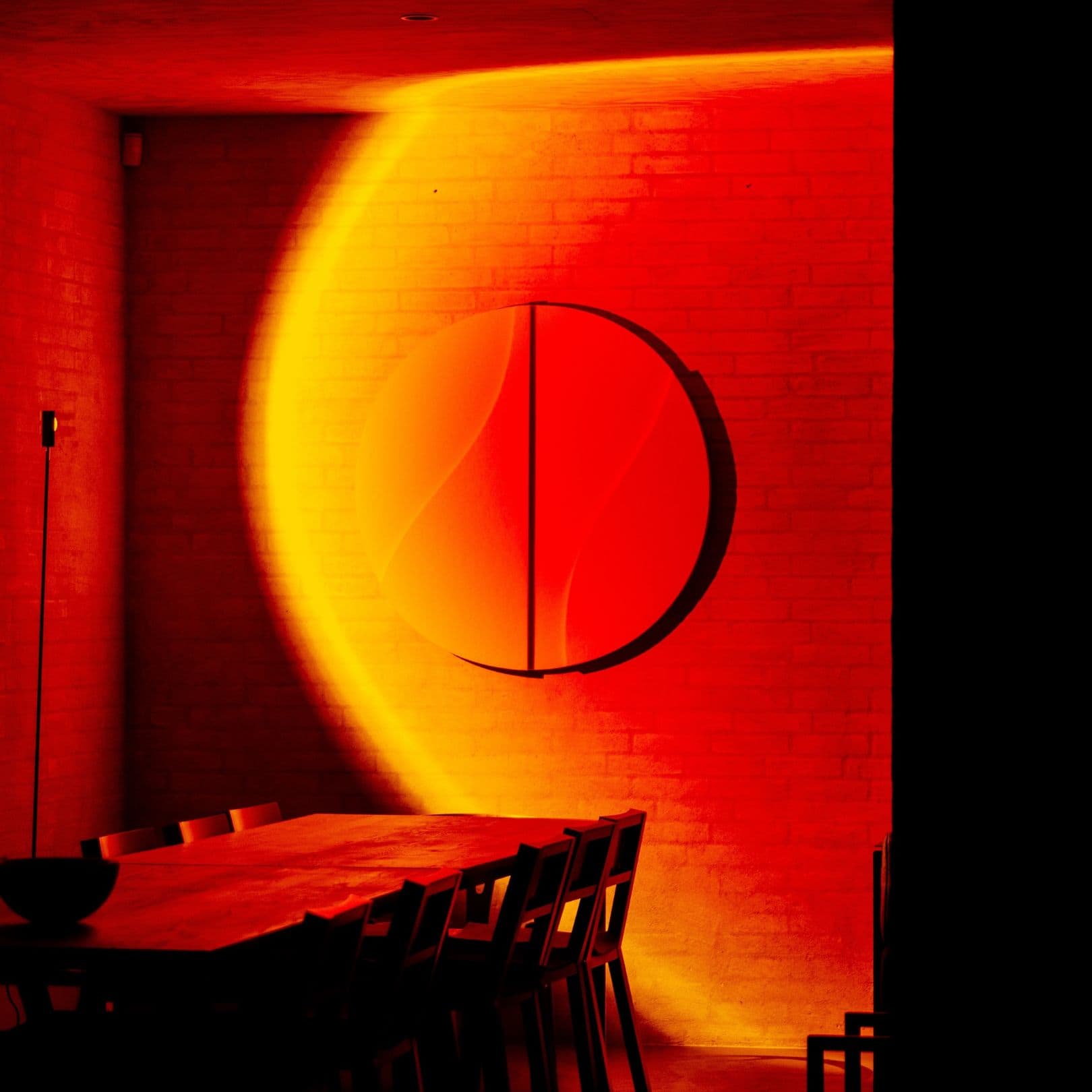 3D light-up wall art by Arturel, enhancing a dining space with warm, ambient lighting.