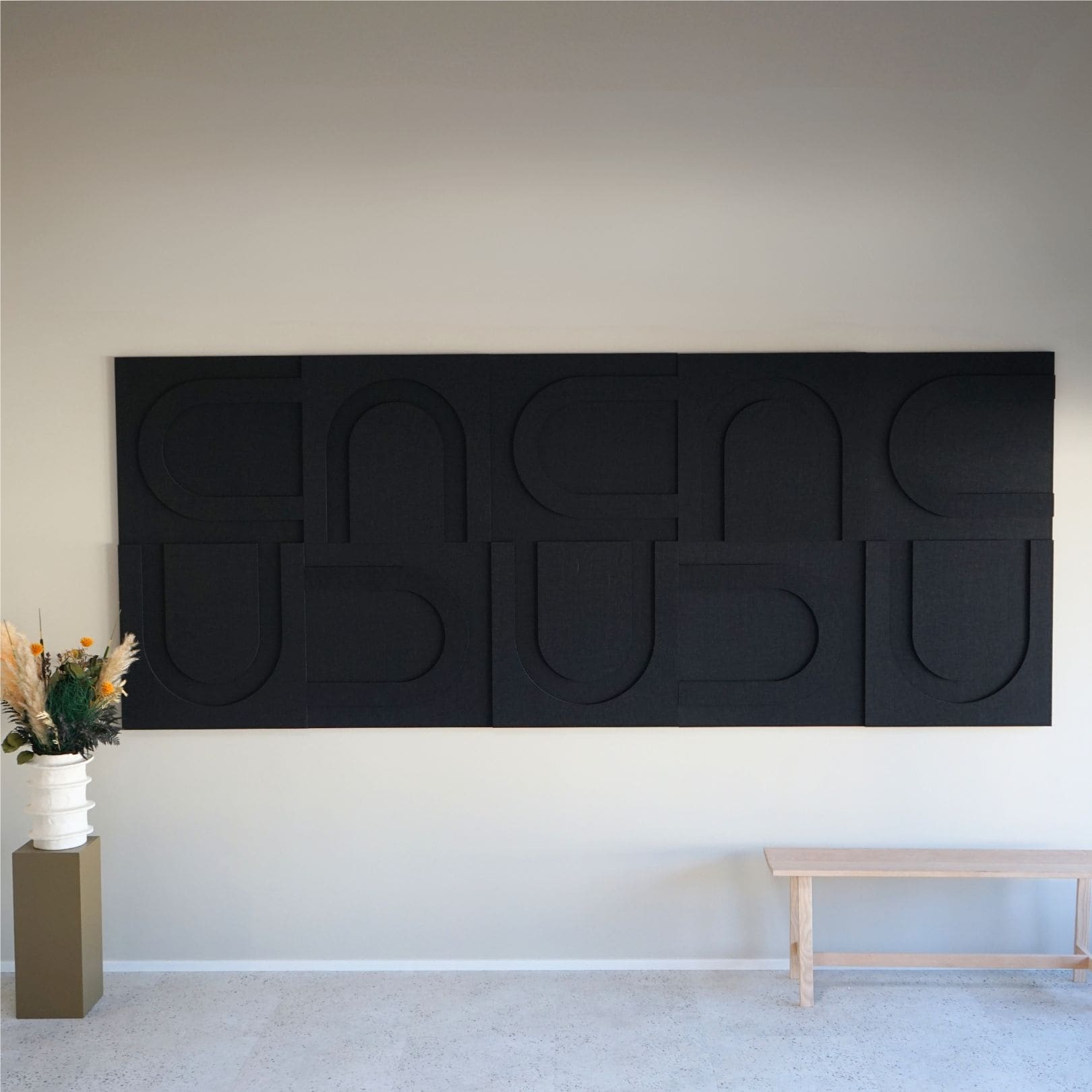 Large black geometric wall art from Arturel, blending minimalist design with acoustic performance.